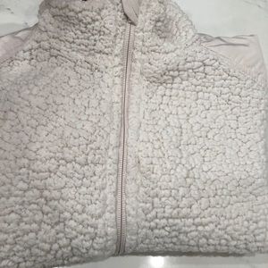 Warm, soft and cozy jacket . One spot on pocket .